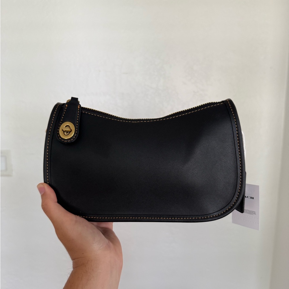 Chic Black Leather Handbag with Gold Detail